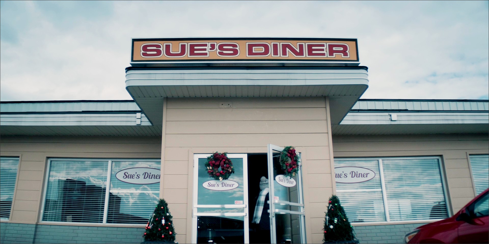 Enseigne du café-restaurant Sue's Diner à Fletcher's Grove